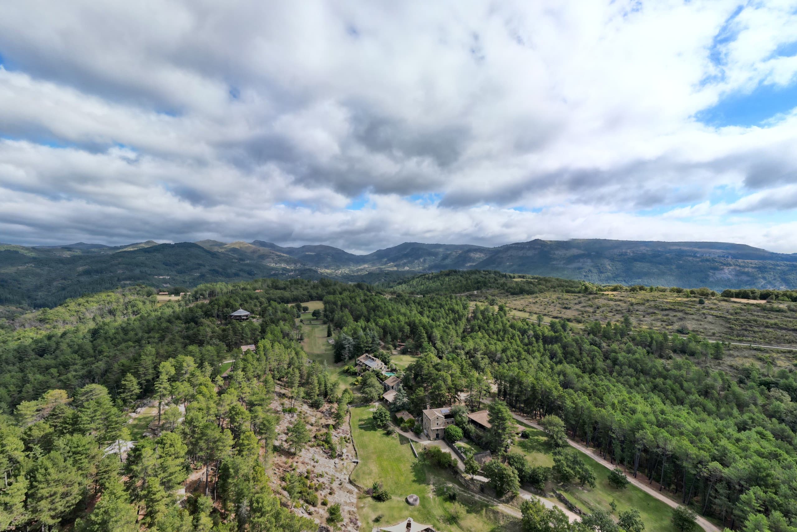 Professional site shot by an HD Media drone, aerial view displayed on a tablet